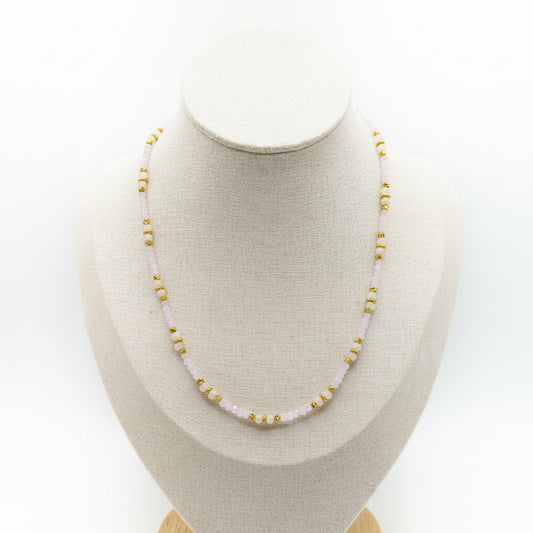 Rapunzel light pink beaded necklace with gold stainless steel accents and marbled crystals.
