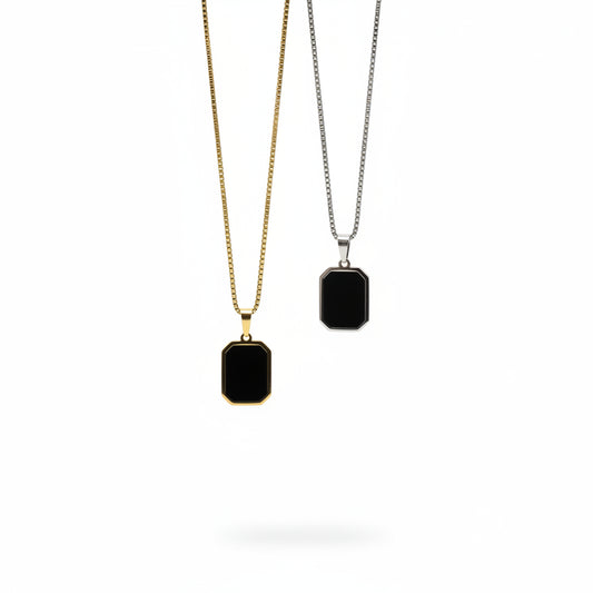 Close-up Midnight Elegance titanium steel box chain necklace in gold and silver.