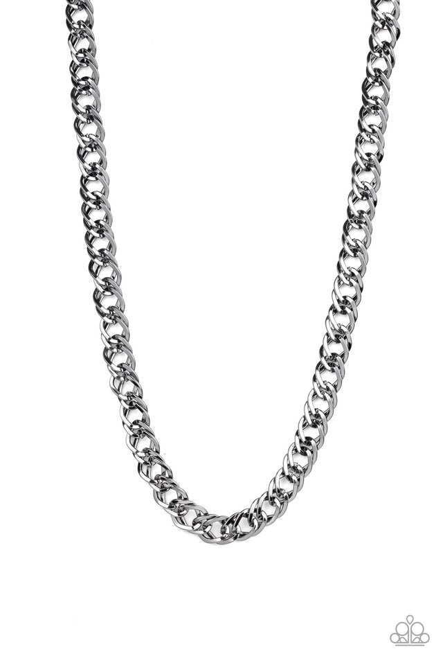 Featuring doubled links, a glistening gunmetal chain drapes across the chest for a bold look. Features an adjustable clasp closure. Sold as one individual necklace.