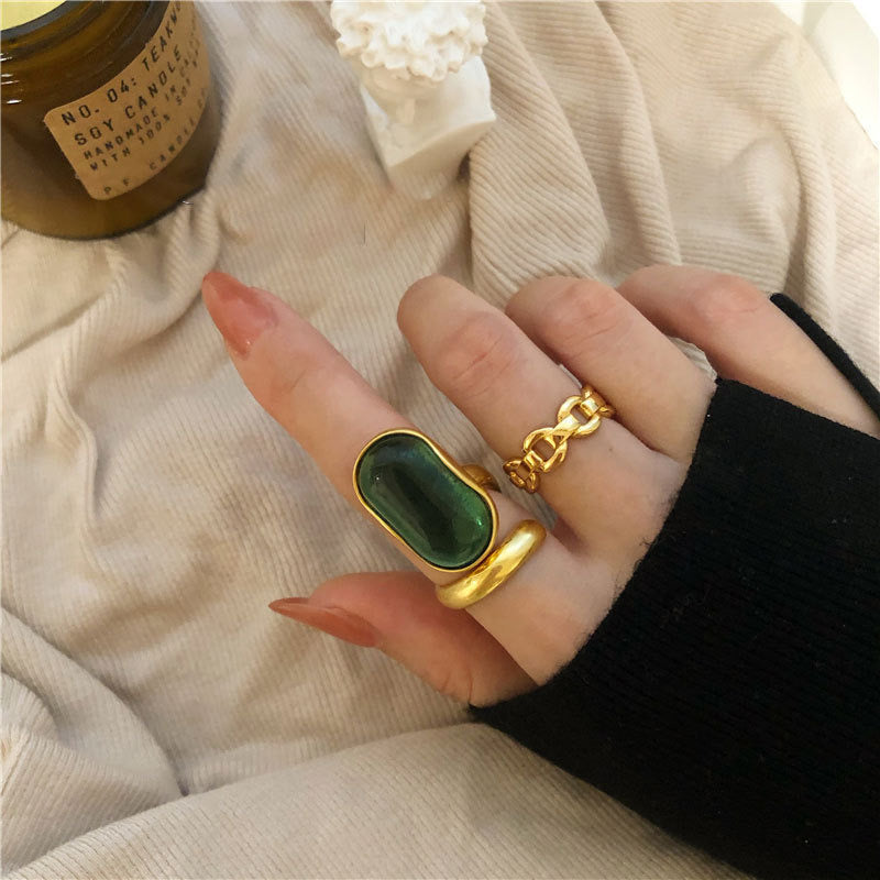 Caitlyn Green and Gold Ring