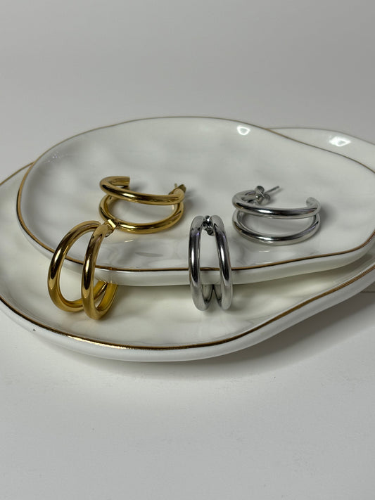 Everyday waterproof stainless steel hoop earrings in gold and silver finishes.