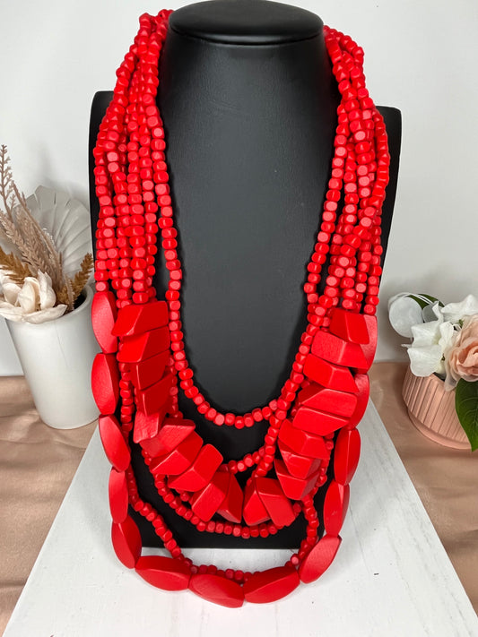Mildred natural wood beaded strand necklace in red.