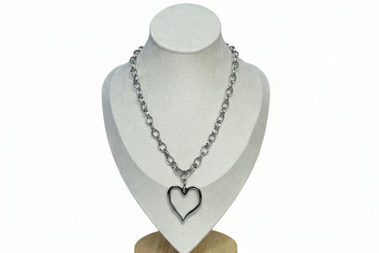 Me Amo 16K gold-plated stainless steel pendant necklace in silver, elegantly displayed on a mannequin. 