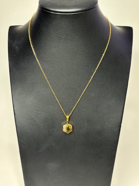 Sienna 18K gold plated stainless steel necklace with hexagon natural stone pendant displayed on a pedestal mannequin.